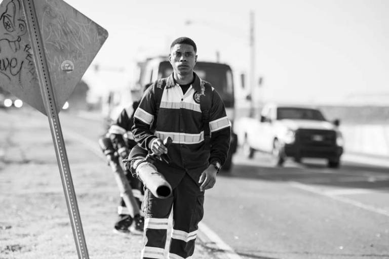 Worker by side of road